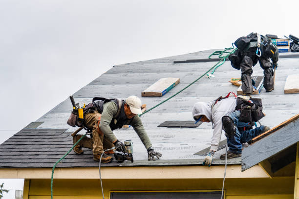 Professional Gutter Installation technician working in Adams, MA